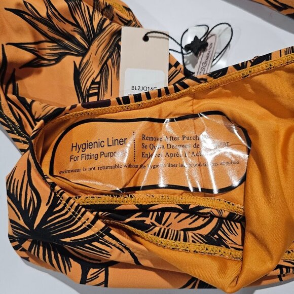 BCBGeneration Jungle Queen Printed Cut-Out One-Piece Swimsuit - Picture 10 of 11